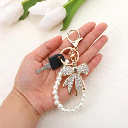 2 Pcs White Rhinestone Bowknot Keychain Imitation Pearl Chains Sparkly Bow Purse Charm Bag Charms for Handbags Purse Backpacks Handbag Charms Keychain Accessories for Women